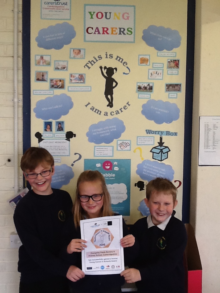 Children holding Bronze Award for supporting Young Carers