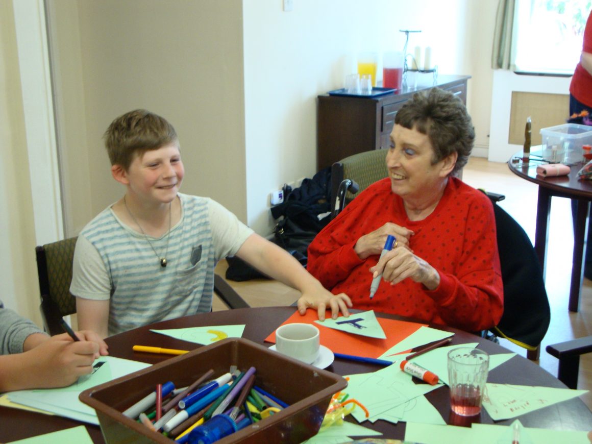 Young carer and elderly person