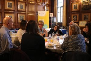 Discussions around table at Peterborough Carers Rights Day event 21 November 2019