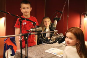 In the studio recording voices for primary schools animation