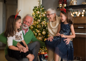 Christmas older couple with grandchildren