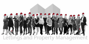 Maxine Lester staff in Christmas hats