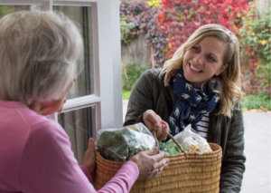 Norfolk Befriending Servive volunteer helping with shopping