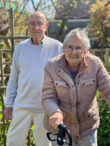 Malcolm and Pat in their garden