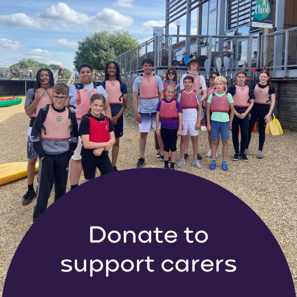 Donate to support carers text with photo of young carers at a watersports centre