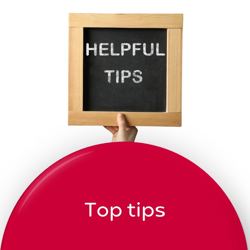 Top tips wording with hand holding chalkboard with 'Helpful tips' written on it