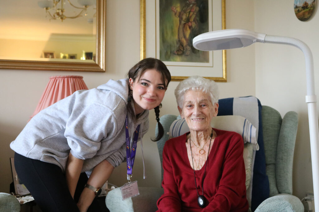 Care Professional, Emily, with a lady she supports