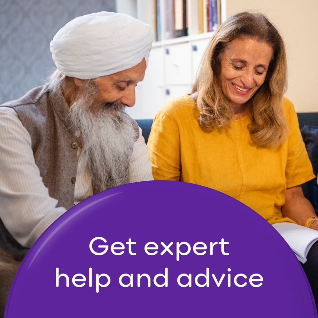Woman talking to a man wearing a turban looking at a book. Wording 'Get expert help and advice'.