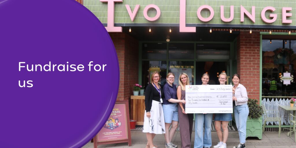 Ivo Lounge team presenting a cheque to Laura, our Fundraising Manager. Wording 'Fundraise for us'.
