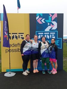 Caring Together Charity staff Ruth, Alice, Lizzie, and Ella