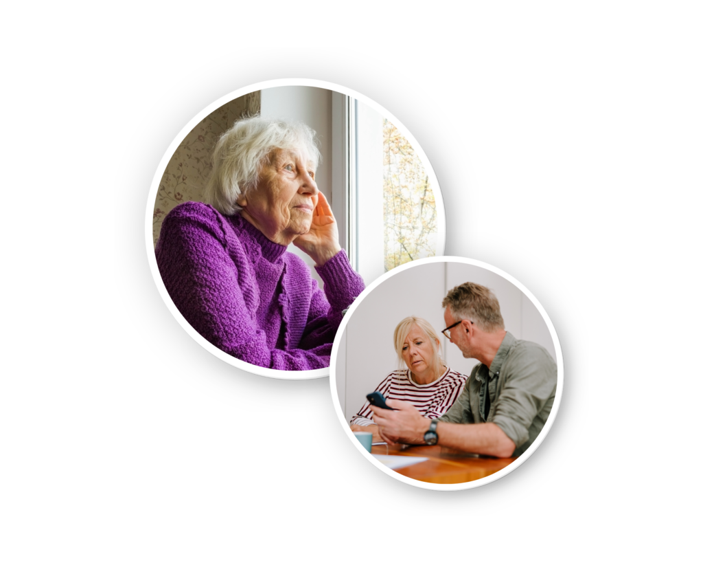Caring for someone with dementia or Alzheimer's disease. Lady looking out of window. Couple siting at table looking at phone.