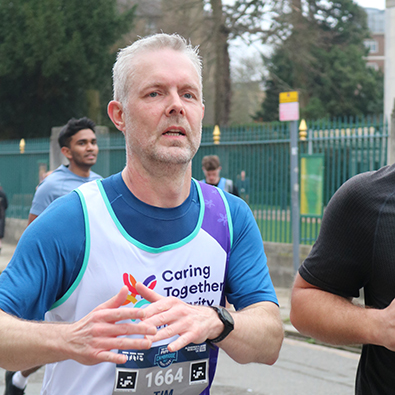 Tim, running for Caring Together Charity in the TTP Cambridge Half Marathon 2026