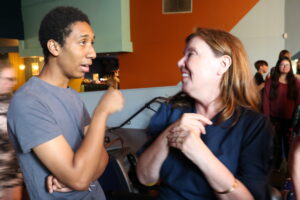 Young carer (left) talking to Children's Commissioner, Dame Rachel de Souza
